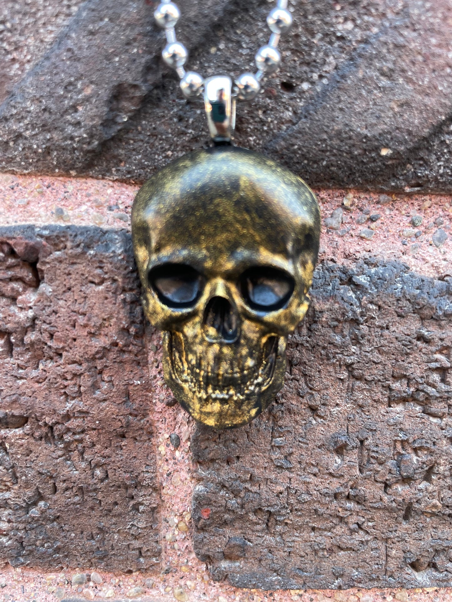 Hand painted Resin Skull Pendant - Gold with Black Eye Sockets